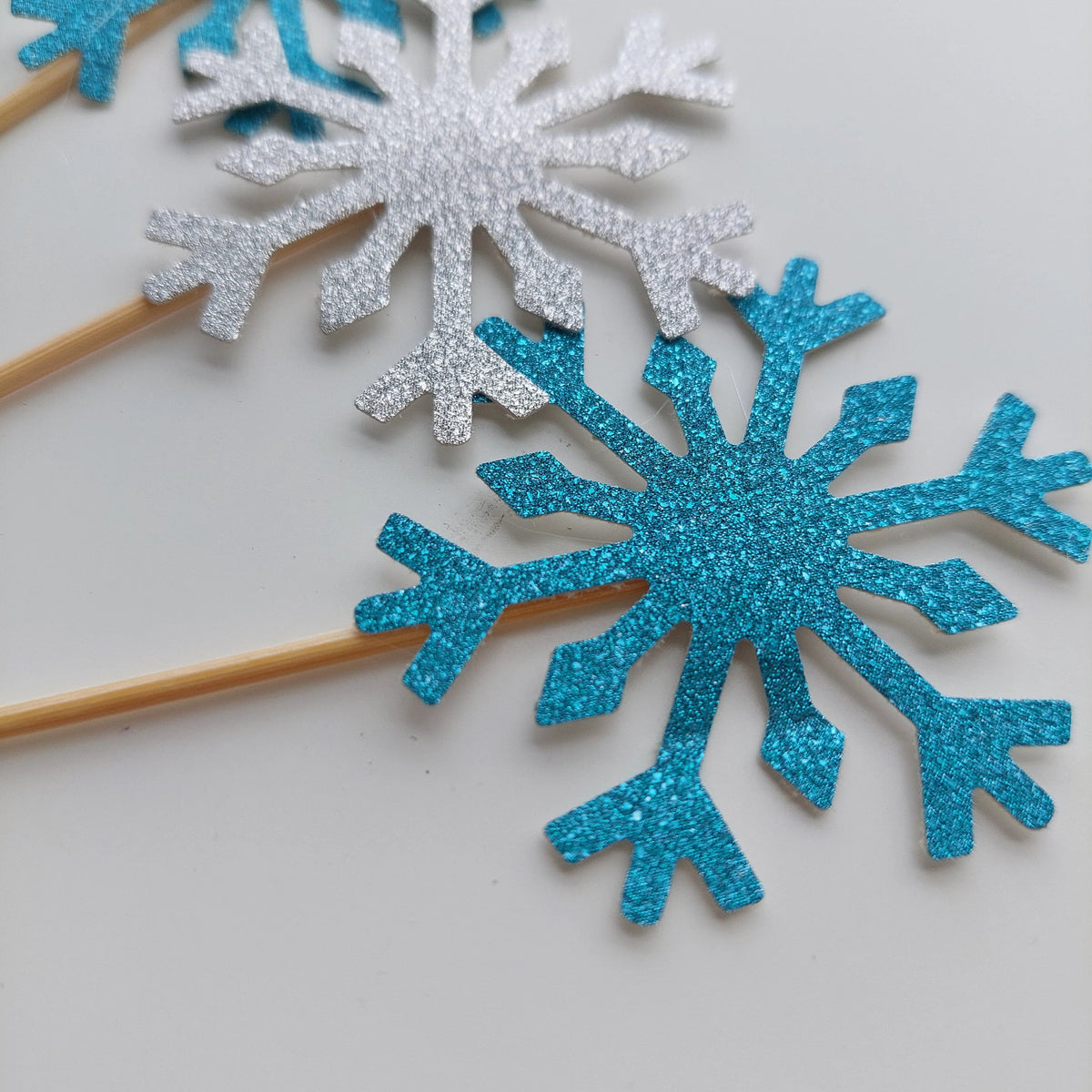 12pcs Blue and silver snow flakes cup cake topper set product photo 4