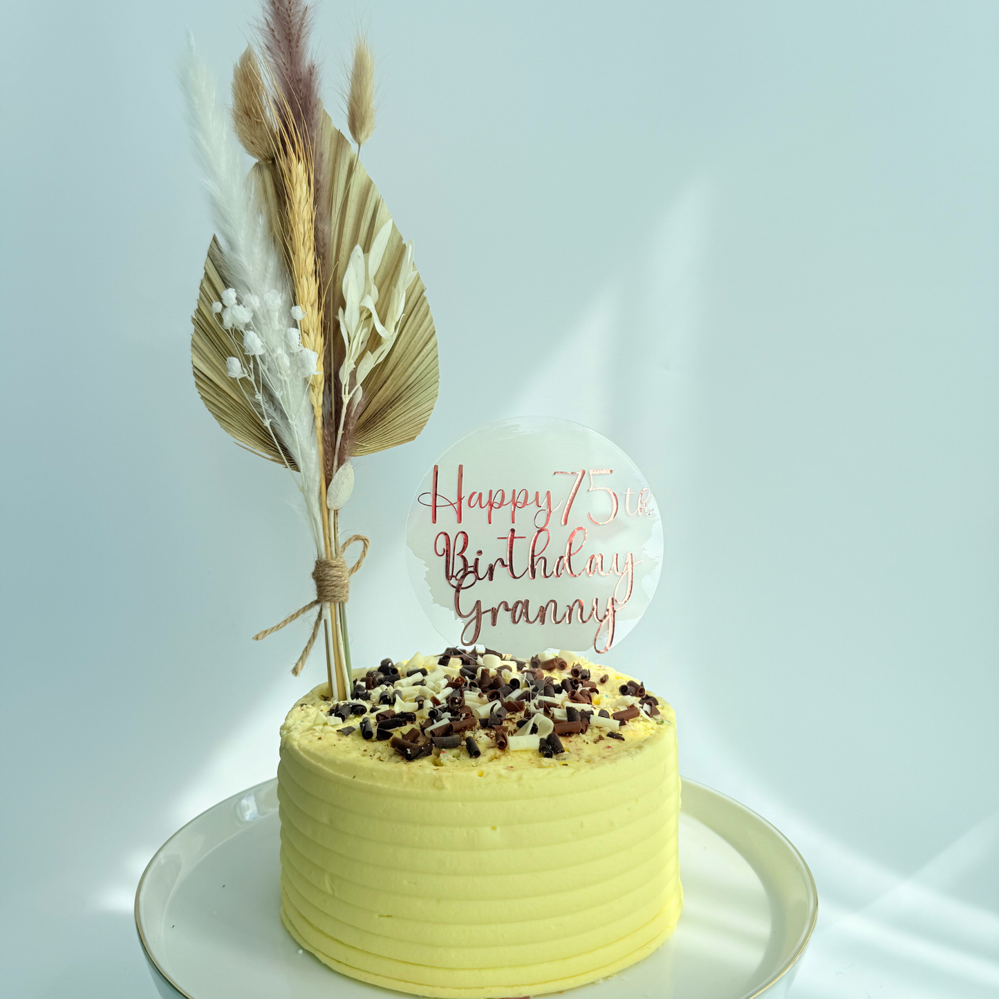 Natural palm fan and dried flowers bouquet