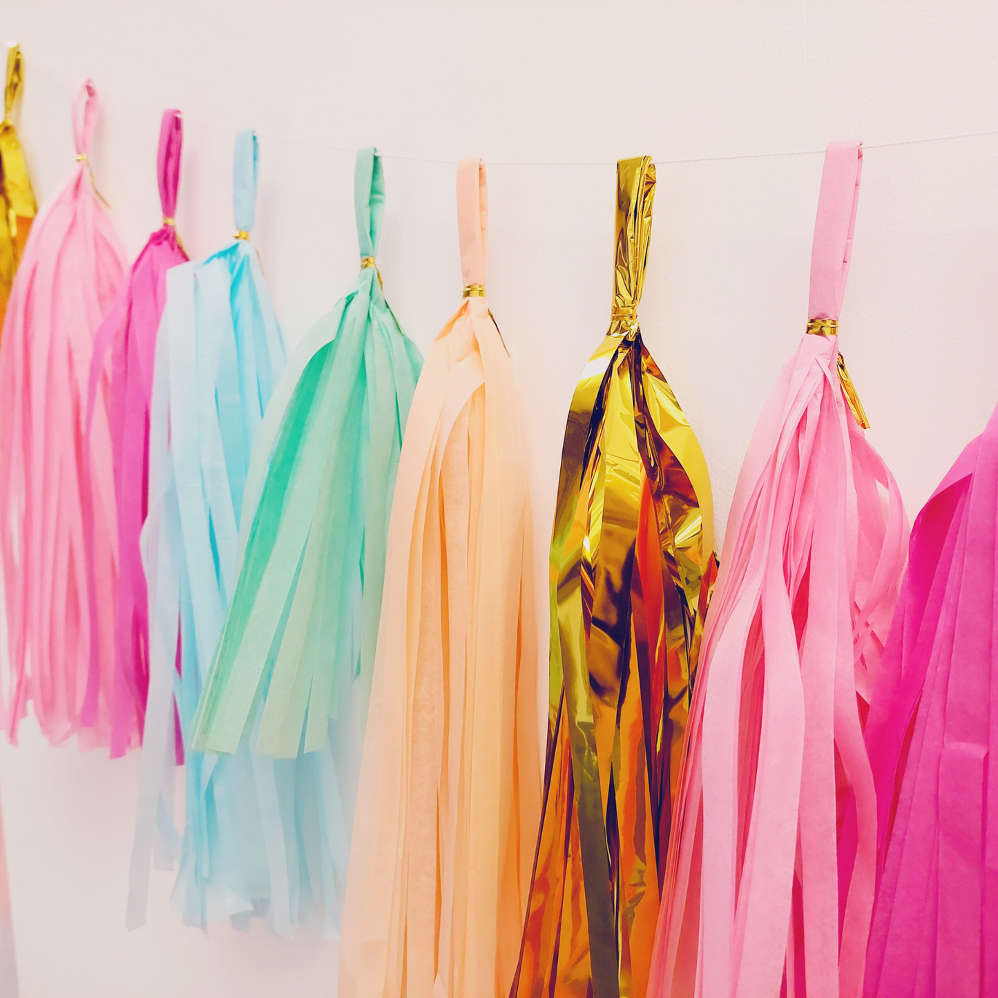 Paper Tassel Garland blue hot pink peach gold tropical summer style