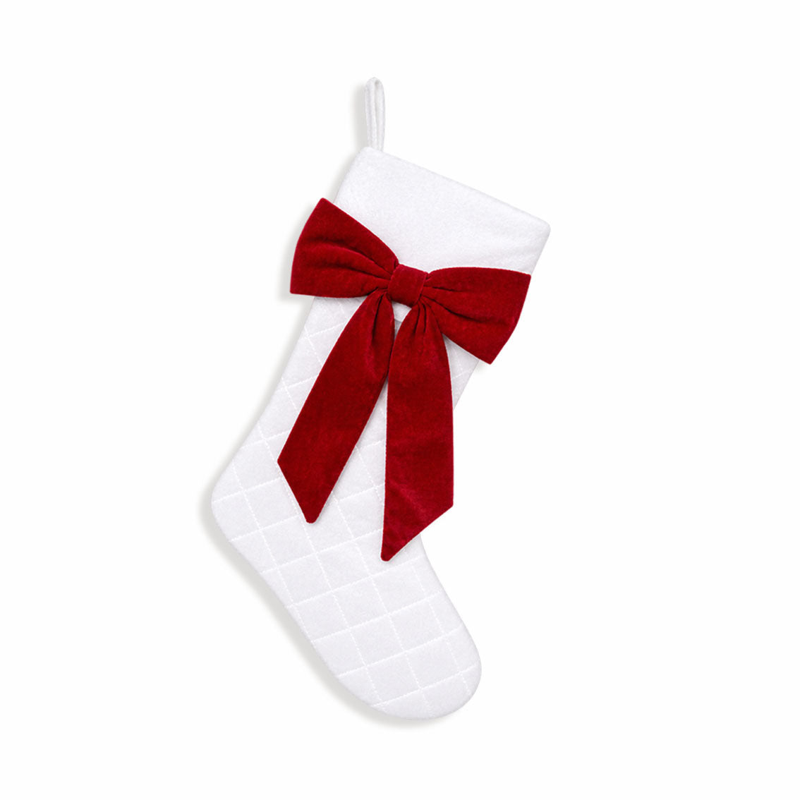 White quilted velvet Christmas stocking with a big red velvet bow and white hanging loop