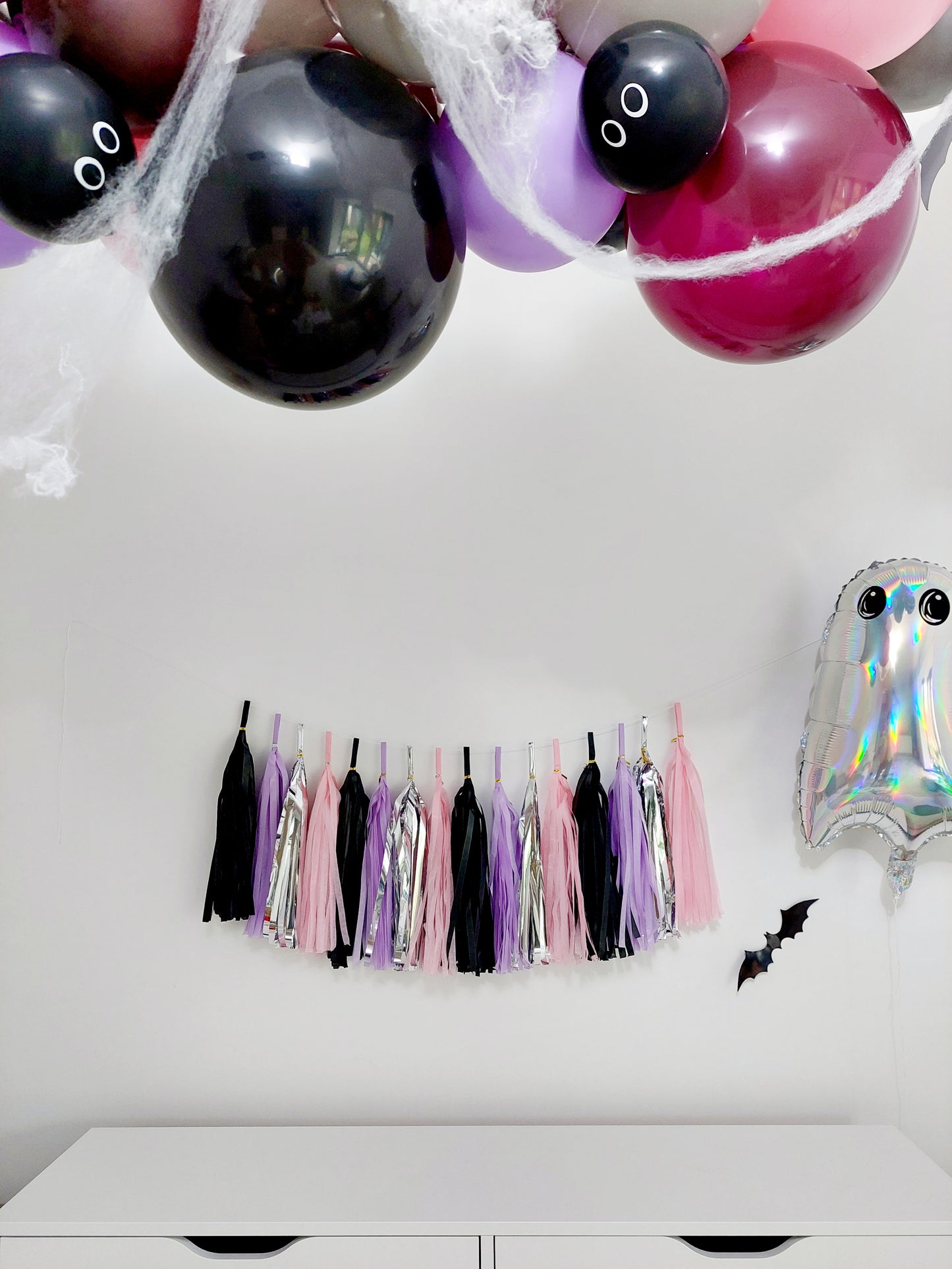 DIY Black Purple Halloween Paper Tassel Garland - TheLittleStuff
