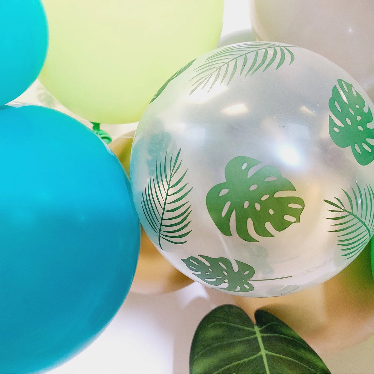 Green and blue dinosaur balloon garland product photo 2