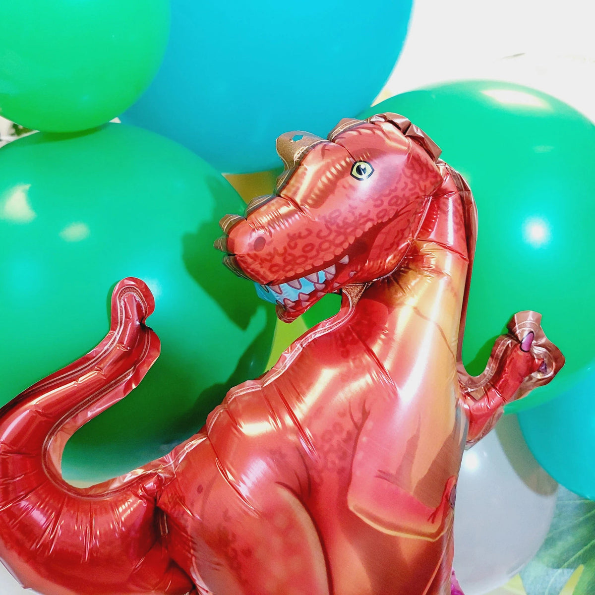 Green and blue dinosaur balloon garland product photo 3